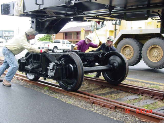 Tender frame eased onto trucks